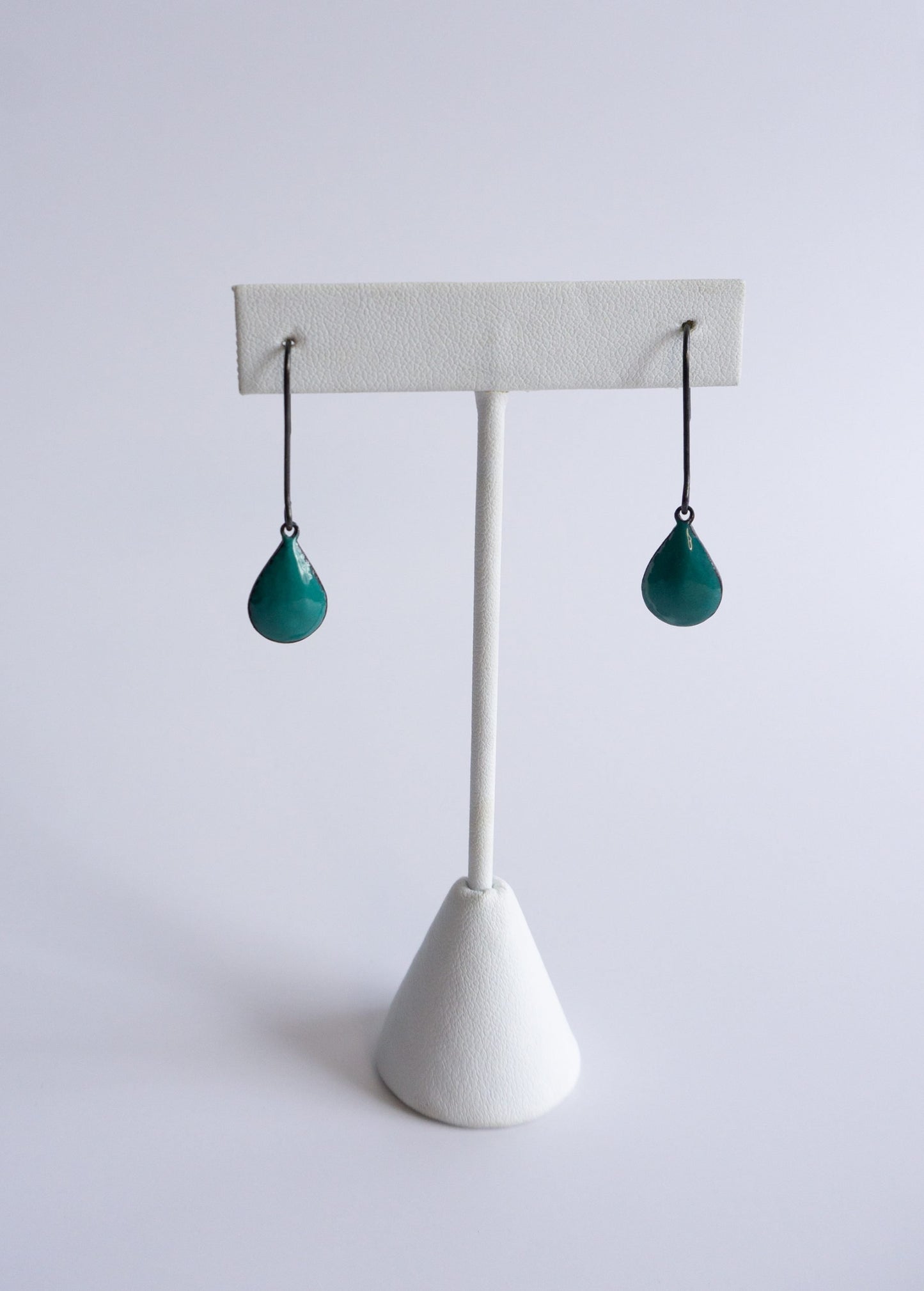 black sterling silver ear wires with green drops