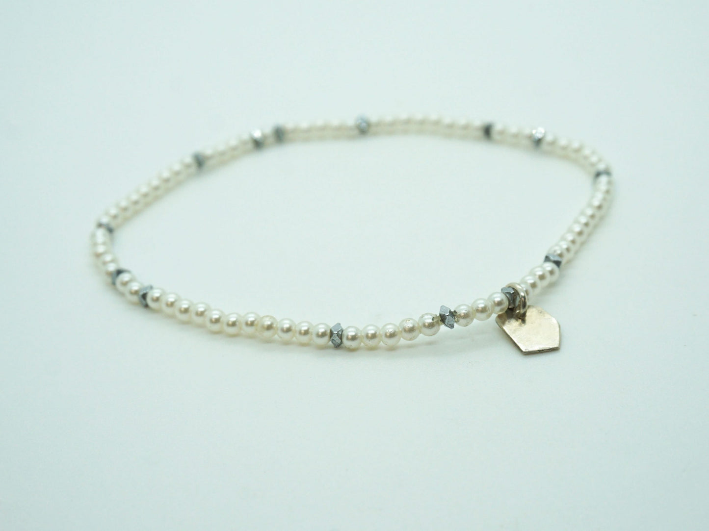white pearls and silver hematite stretch bracelet for her