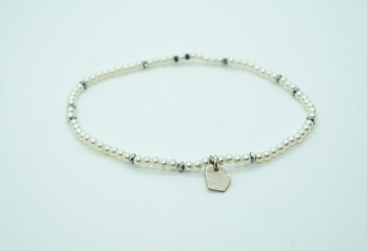 white and silver stretch bracelet