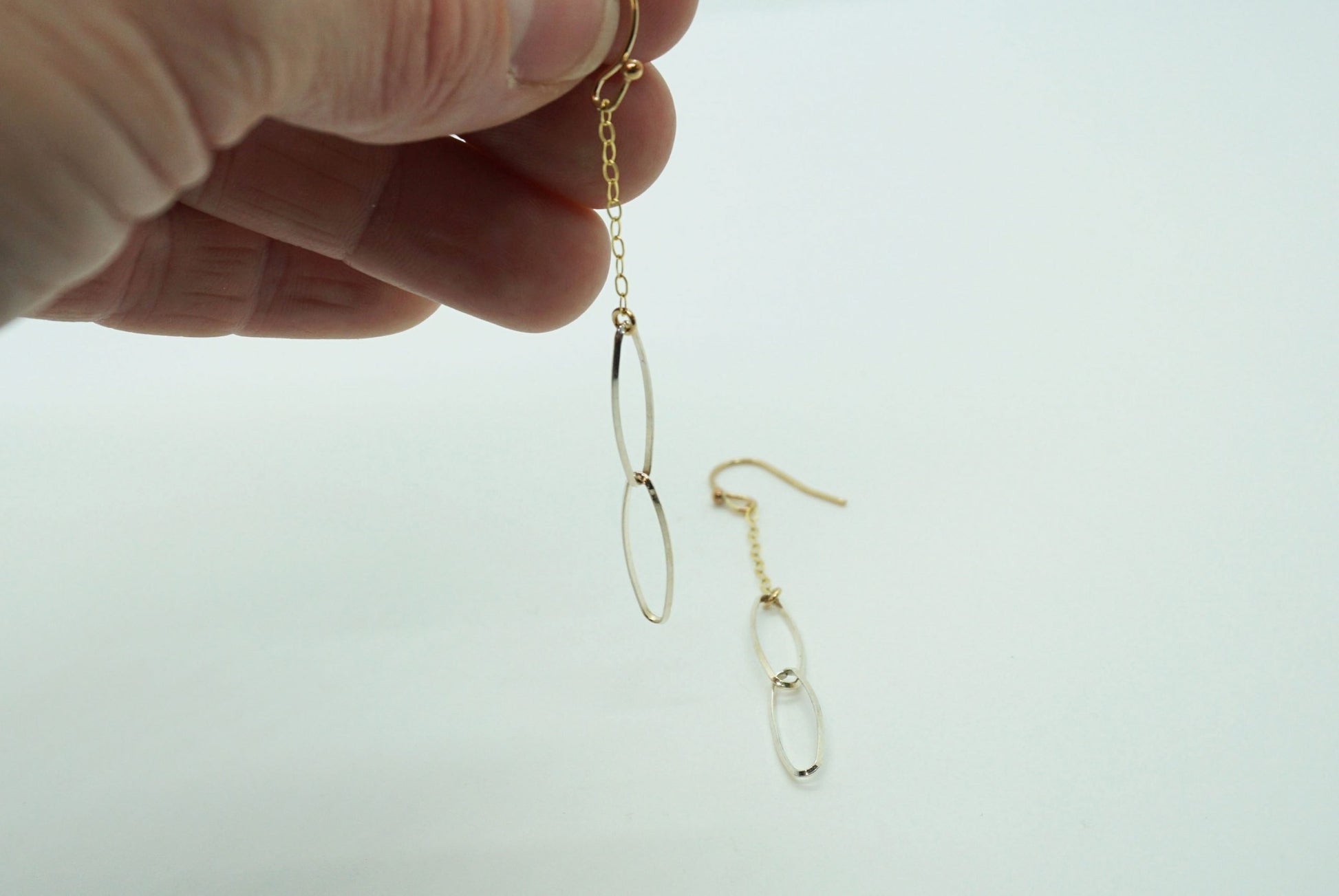 silver and gold chain earrings