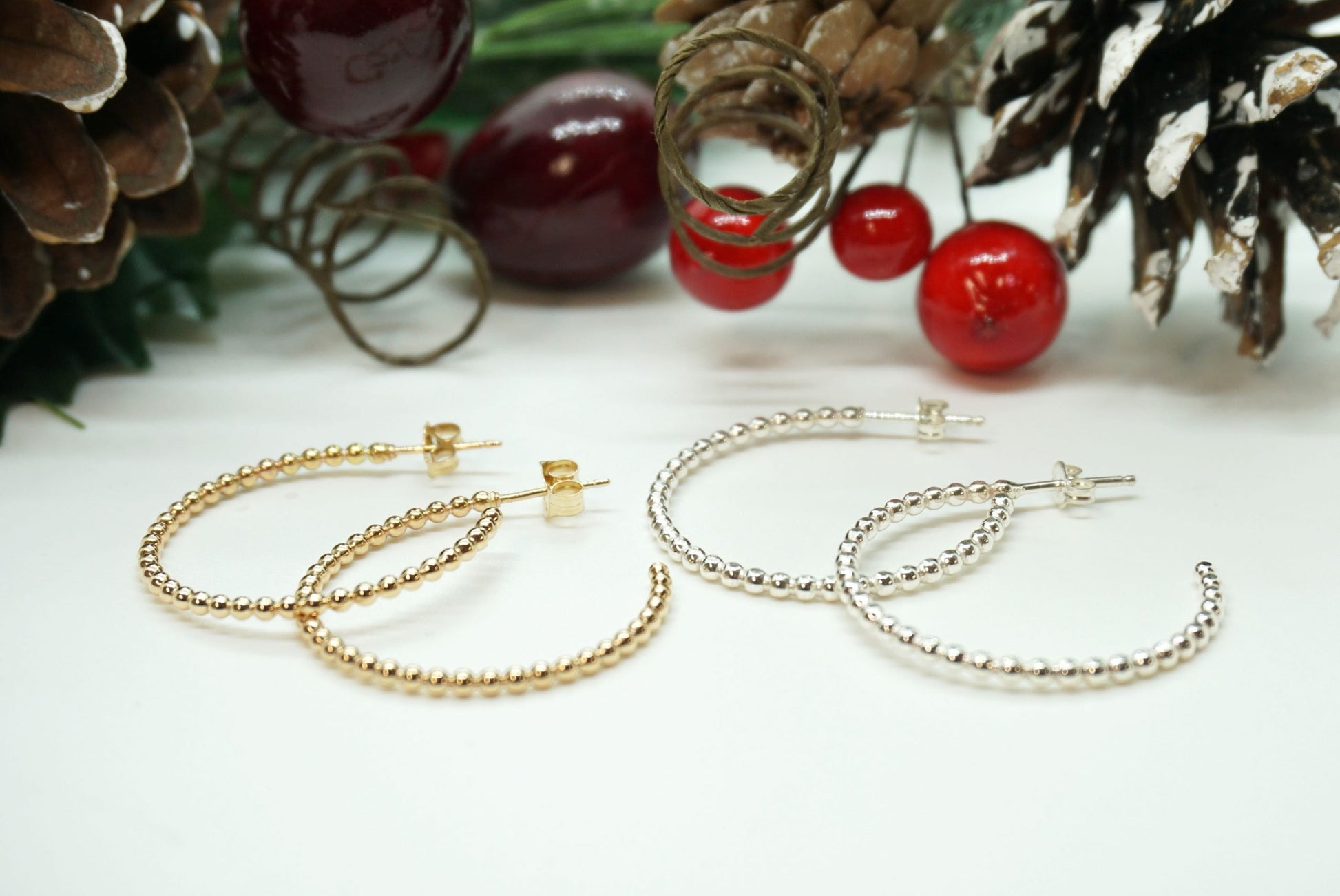 silver and gold beaded hoop earrings