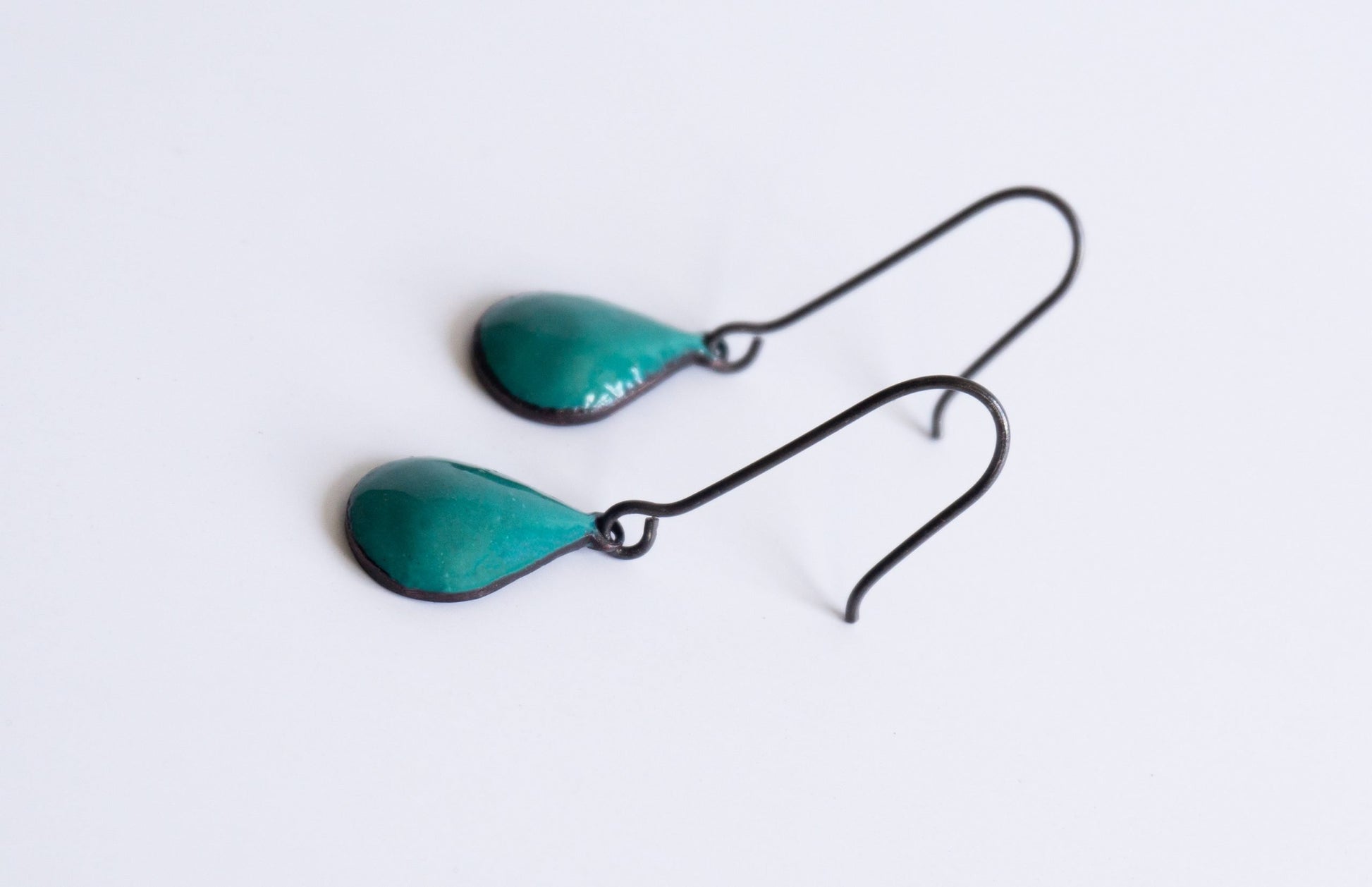 blackened silver ear wires with blue-green raindrops