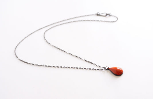blackened silver chain with flame raindrop