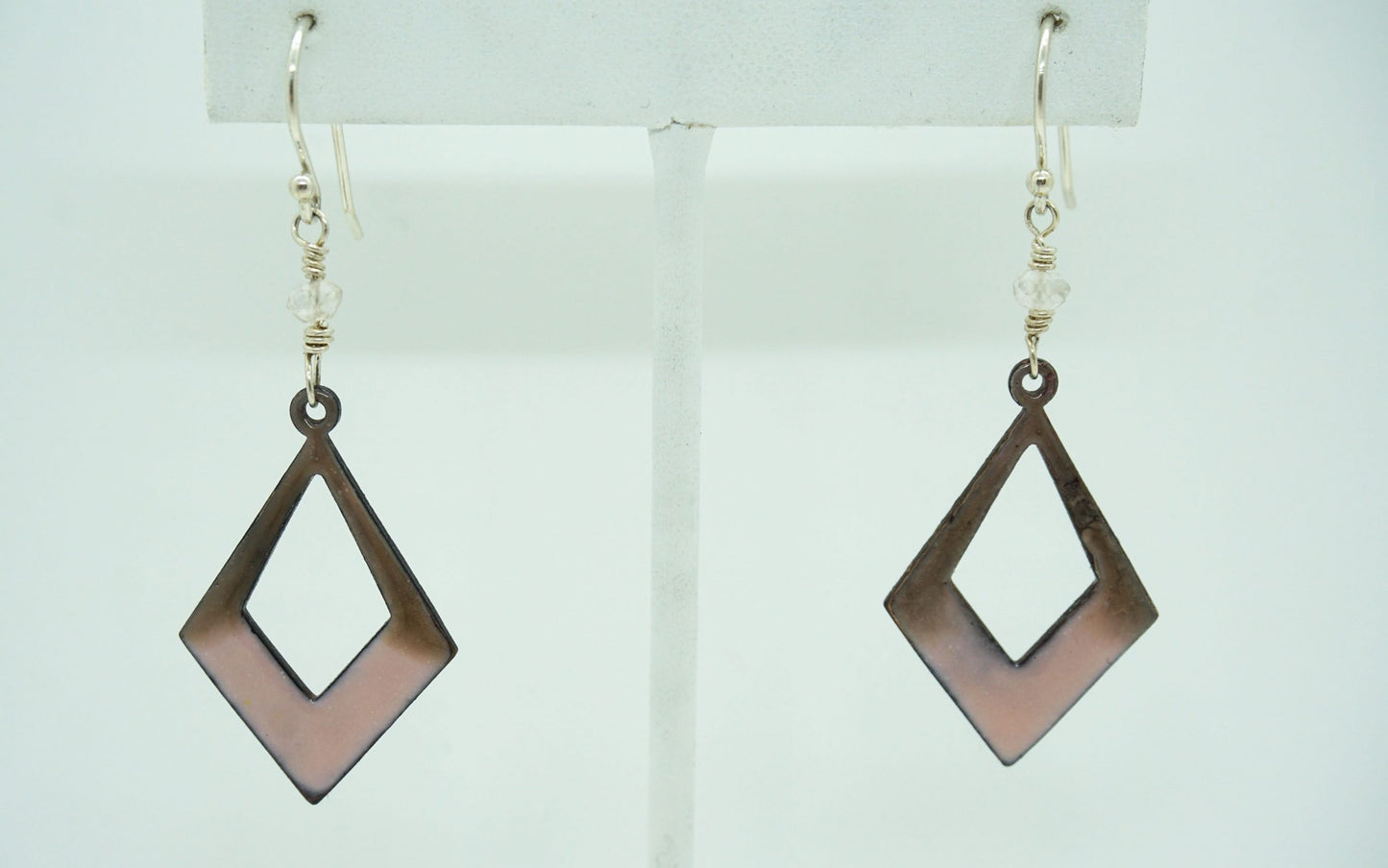 Pink earrings with topaz accent