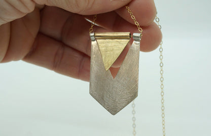 Silver and brass flag pendant necklace
