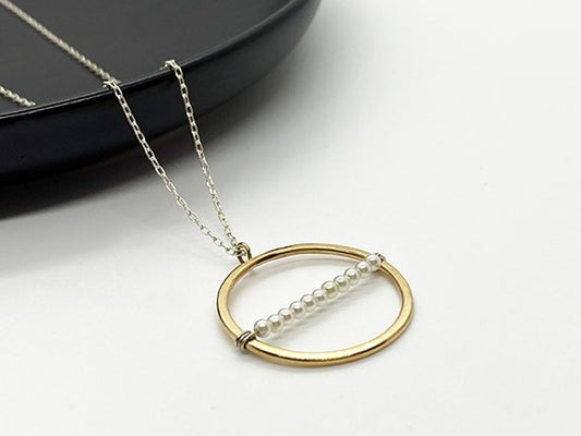 Gold circle pearl pendant necklace