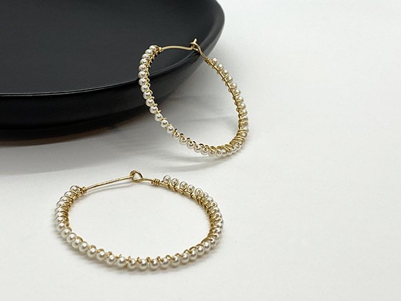 Pearl wrapped gold hoop earrings