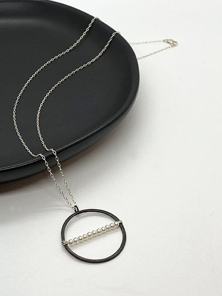 Black silver circle pendant necklace
