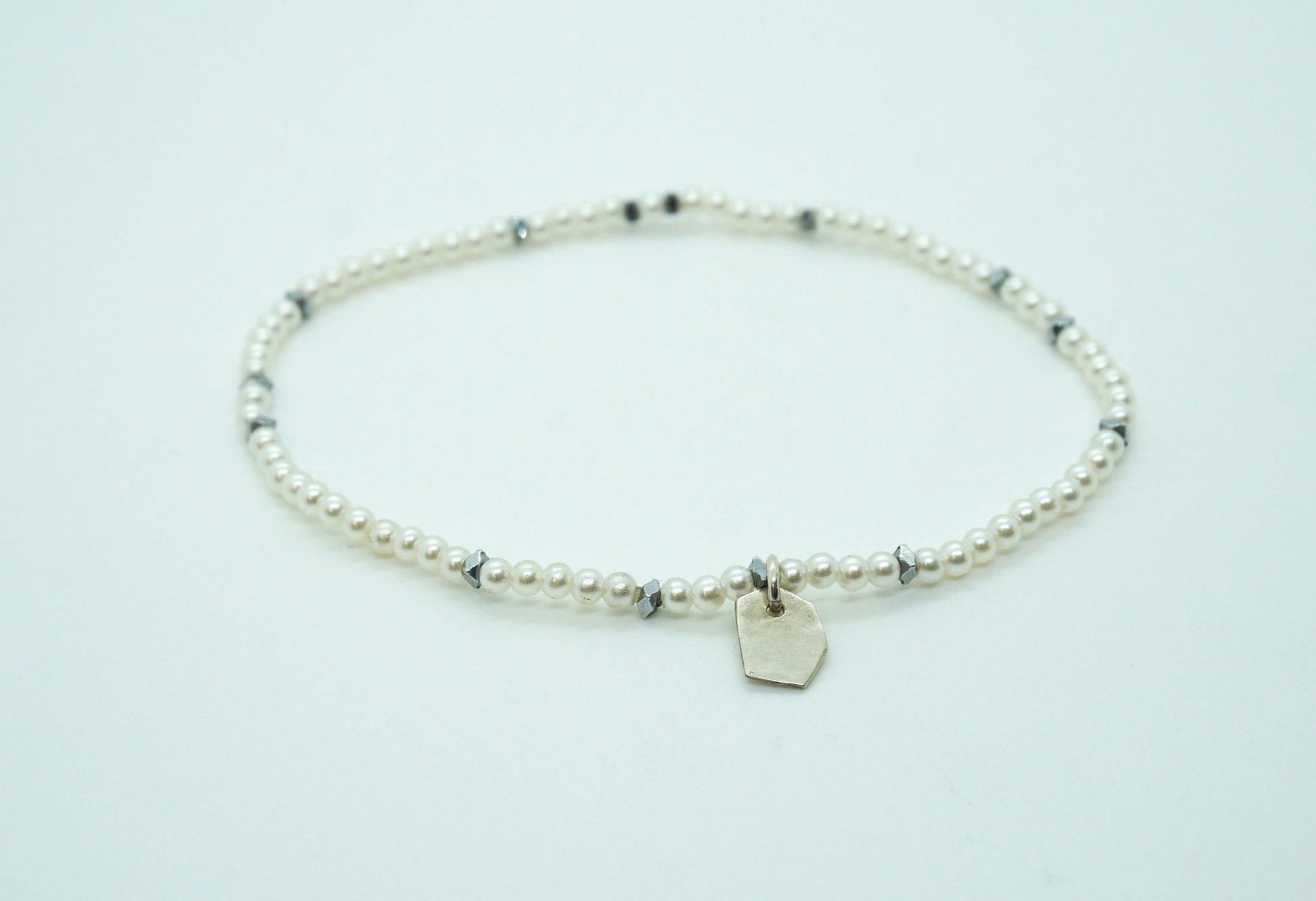 white and silver stretch bracelet